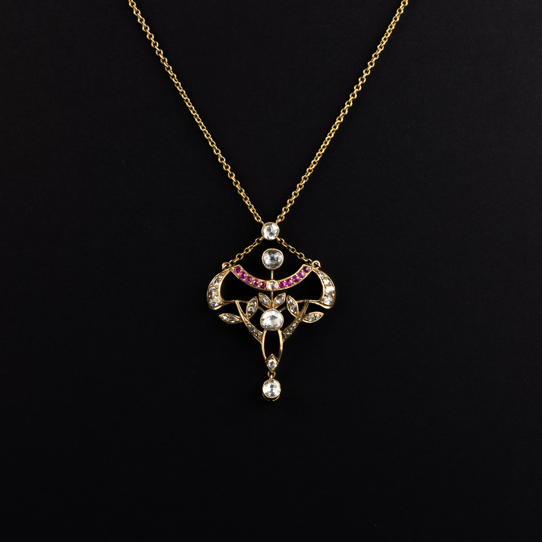Collana in oro 18kt, diamanti e rubini